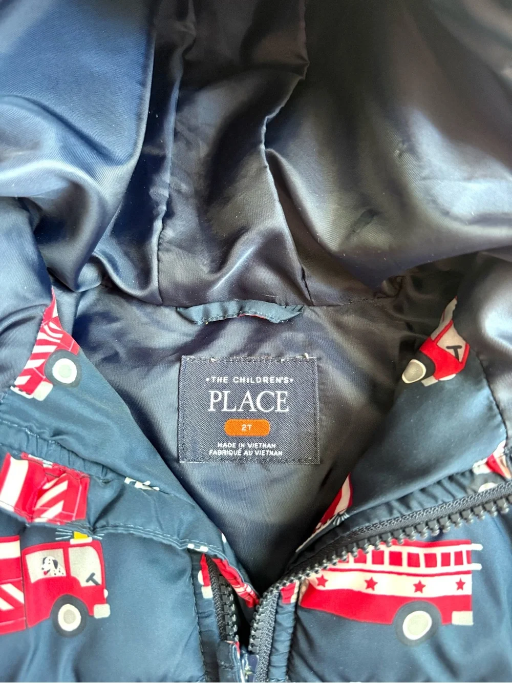 The Children’s Place Kids Navy Puffer Jacket with Red Fire Truck Print
